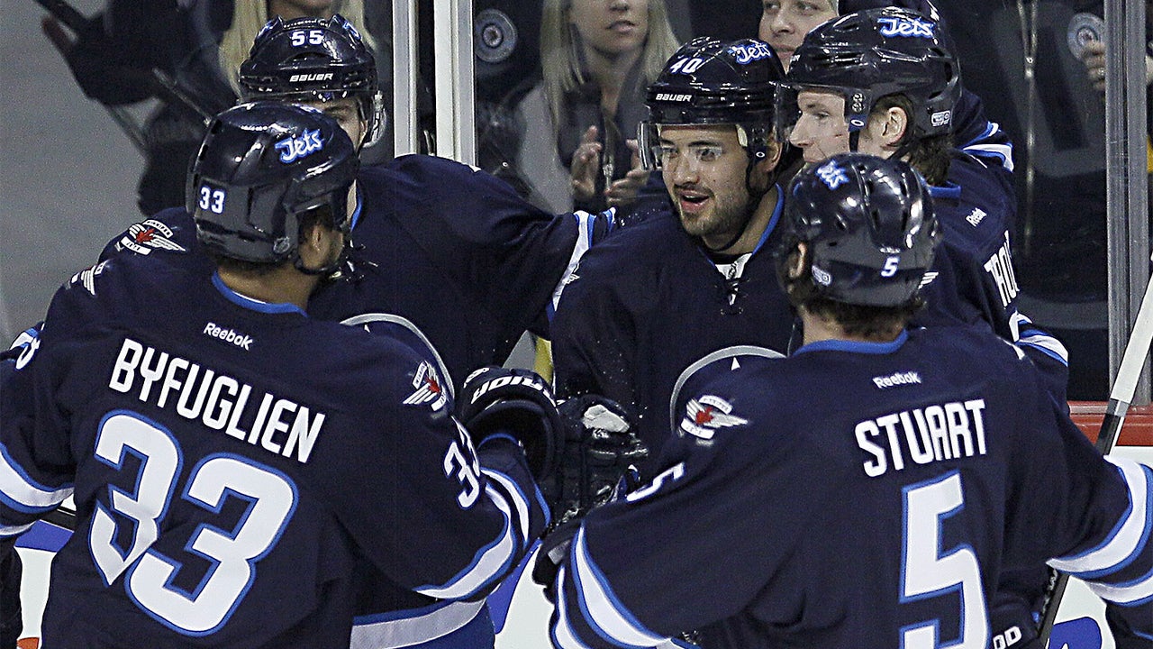Setoguchi scores twice as surging Jets slip past Canucks